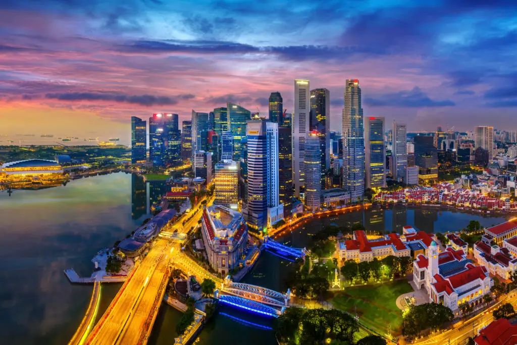 Aerial view of Singapore city at twilight.